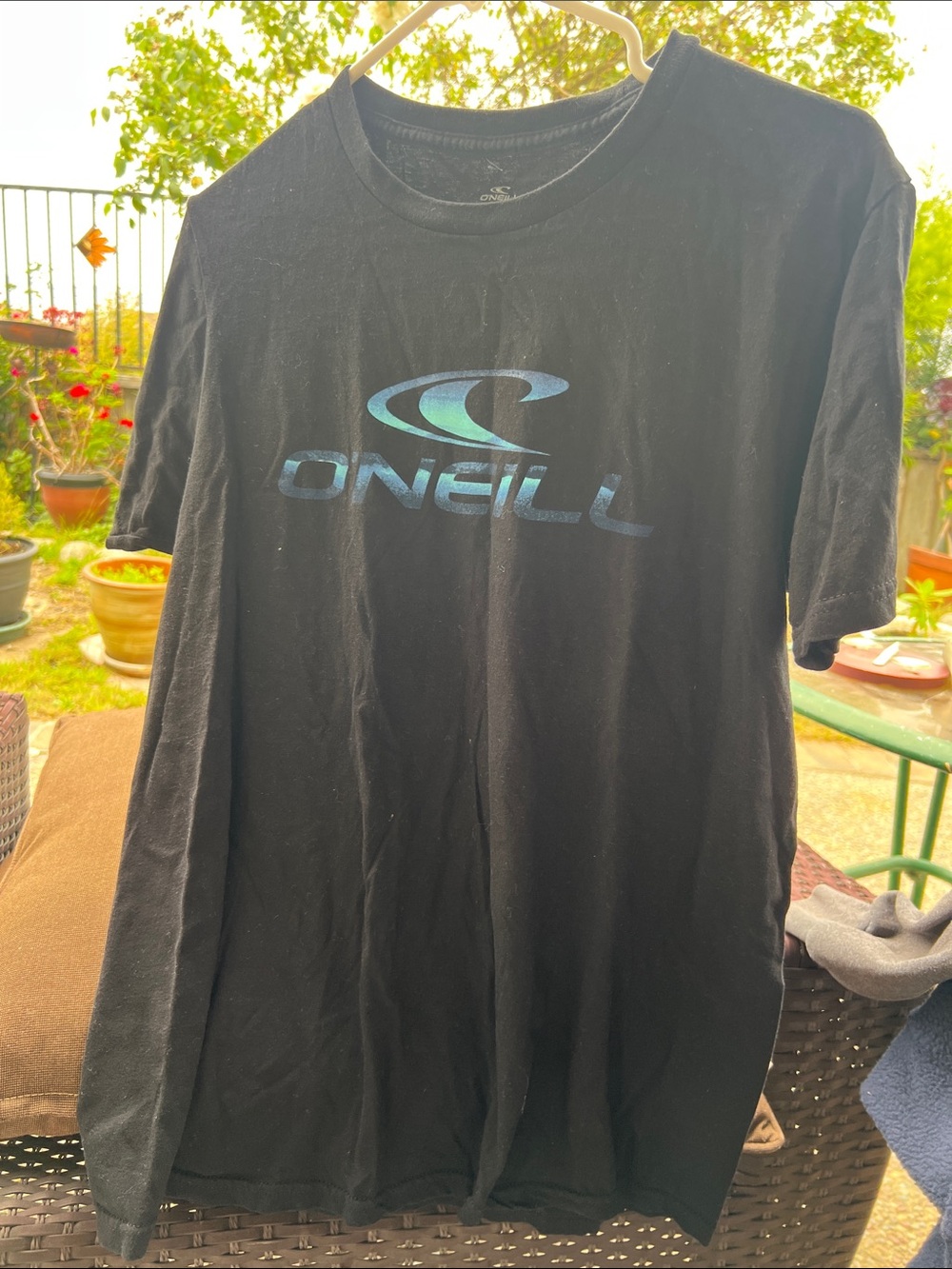 O'Neill Black Tee with Iridescent Blue-Green Logo